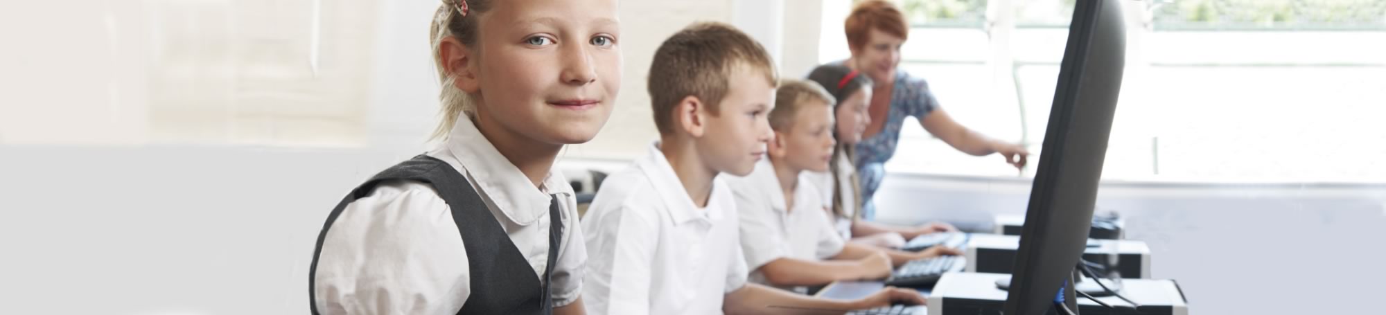 Pupils in a UK primary school using Spellzone in the computer room
